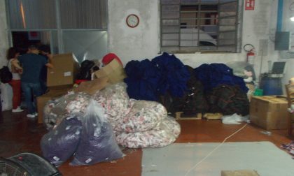 Lavoro nero e sfruttamento nel tessile a Prato: arrestata imprenditrice, dieci operai irregolari nascosti nel laboratorio